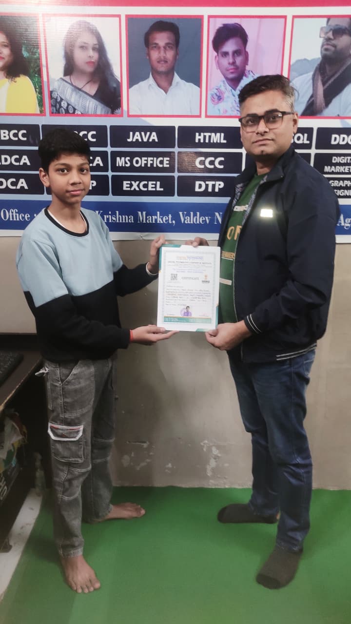 DTCI computer programme student receiving a certificate