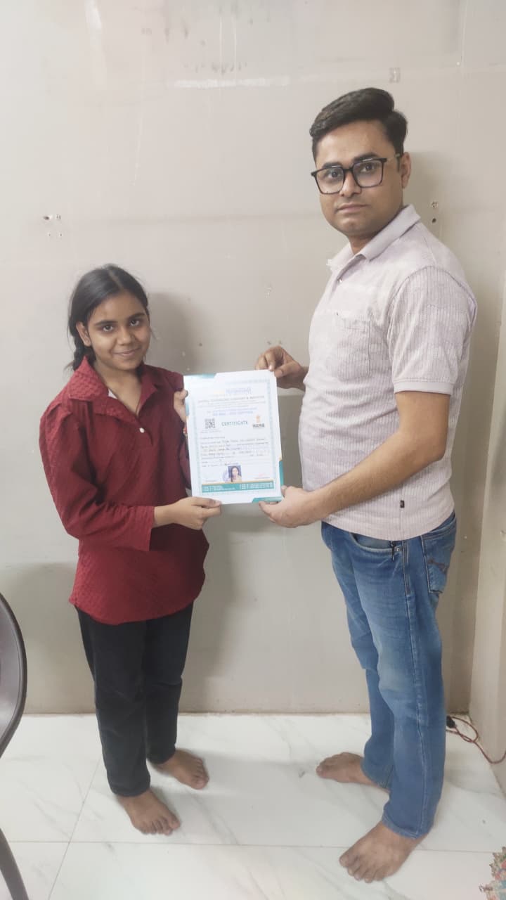 DTCI learner receiving a course certificate