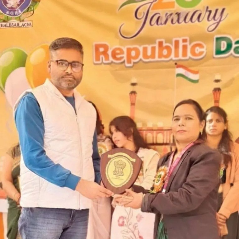 DTCI founder presenting a recognition award